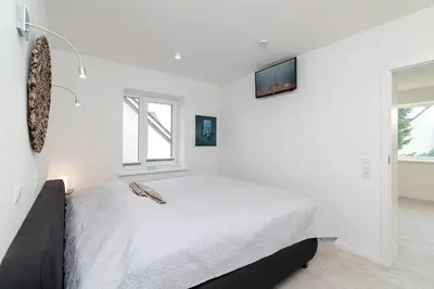 Ein Bett oder Betten in einem Zimmer der Unterkunft Badeweg 7 James Dean