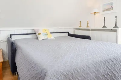 Ein Bett oder Betten in einem Zimmer der Unterkunft Witthus Schwalbennest