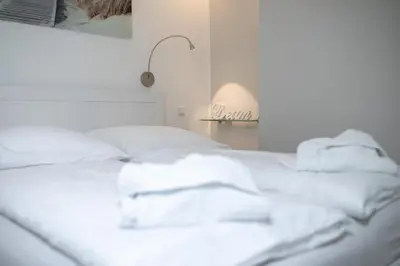 Ein Bett oder Betten in einem Zimmer der Unterkunft Hang 15 Molto Sole