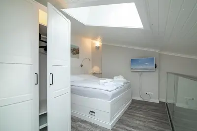Ein Bett oder Betten in einem Zimmer der Unterkunft Hang 15 Molto Sole