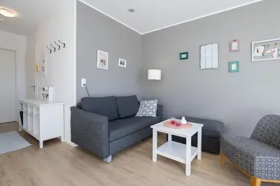 Ein Sitzbereich in der Unterkunft Fischerhuus Wohnung 1
