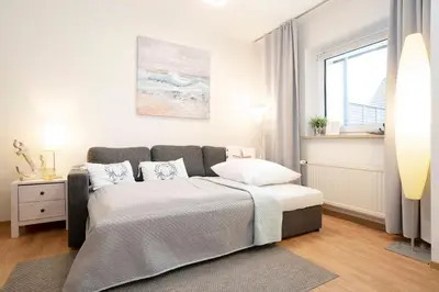 Ein Bett oder Betten in einem Zimmer der Unterkunft Badeweg 4 Kleiner Anker