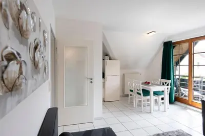 Ein Sitzbereich in der Unterkunft Alte Bergstraße 6 Meerforelle
