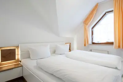 Ein Bett oder Betten in einem Zimmer der Unterkunft Alte Bergstraße 6 Flundernest