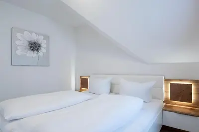 Ein Bett oder Betten in einem Zimmer der Unterkunft Alte Bergstraße 6 Flundernest