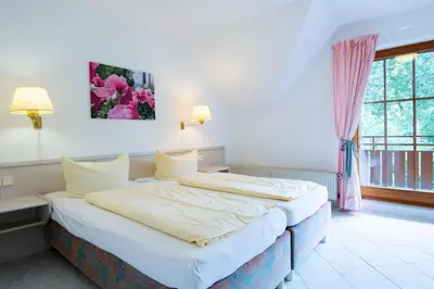 Ein Bett oder Betten in einem Zimmer der Unterkunft Haus am Kurpark Scharbeutz Wohnung 10