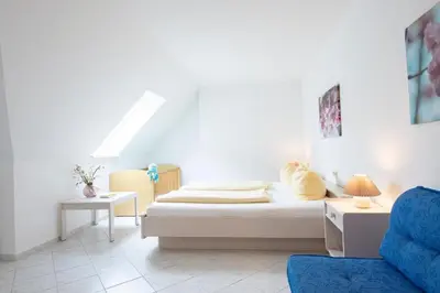 Ein Sitzbereich in der Unterkunft Haus am Kurpark Scharbeutz Wohnung 10