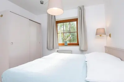Ein Bett oder Betten in einem Zimmer der Unterkunft Haus am Kurpark Scharbeutz Wohnung 8