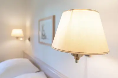 Ein Bett oder Betten in einem Zimmer der Unterkunft Haus am Kurpark Scharbeutz Küstenstern