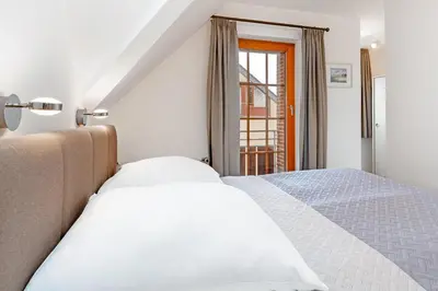 Ein Bett oder Betten in einem Zimmer der Unterkunft Schmiedestraße 3 Wohnung 7