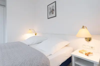 Ein Bett oder Betten in einem Zimmer der Unterkunft Seepferdchen Stüble