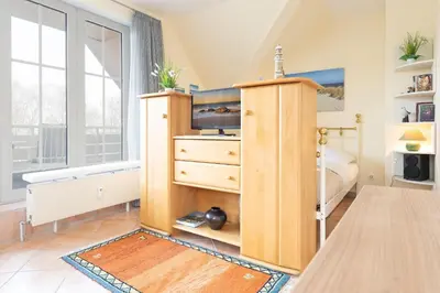 Ein Bett oder Betten in einem Zimmer der Unterkunft Seepark Küstenschimmer