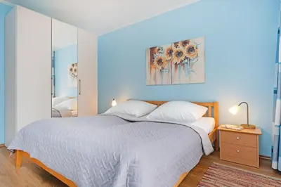 Ein Bett oder Betten in einem Zimmer der Unterkunft Haus Baltic Ostseeidylle