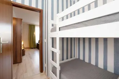 Ein Bett oder Betten in einem Zimmer der Unterkunft Haus Baltic Ostseeidylle