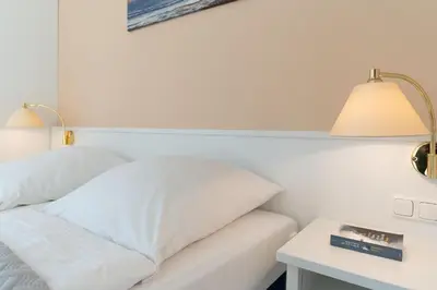 Ein Bett oder Betten in einem Zimmer der Unterkunft Seepferdchen Deern