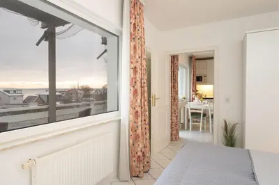 Ein Bett oder Betten in einem Zimmer der Unterkunft Seepferdchen Blomen