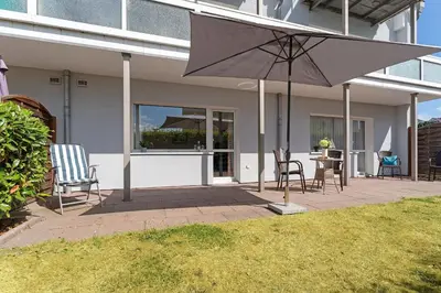 Ein Patio oder anderer Außenbereich in der Unterkunft Seepferdchen Wellenstuv