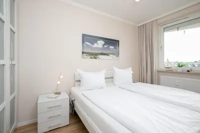 Ein Bett oder Betten in einem Zimmer der Unterkunft Haus Beau Rivage Ostseegrass