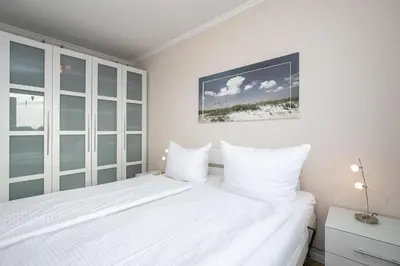 Ein Bett oder Betten in einem Zimmer der Unterkunft Haus Beau Rivage Ostseegrass