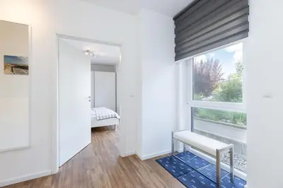 Ein Bett oder Betten in einem Zimmer der Unterkunft Badeweg 15 Düne24