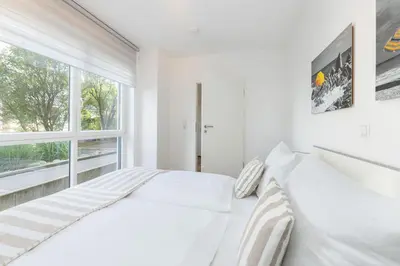 Ein Bett oder Betten in einem Zimmer der Unterkunft Badeweg 15 Düne24