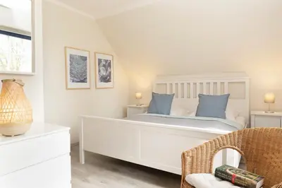Ein Bett oder Betten in einem Zimmer der Unterkunft Seepark Lindenallee Krabbe