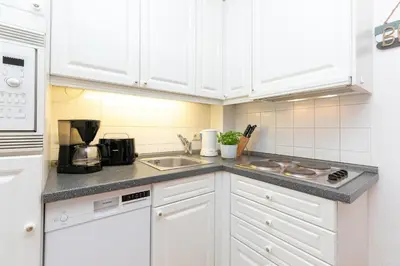 Küche/Küchenzeile in der Unterkunft Seepark Wohnung 15