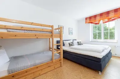 Ein Bett oder Betten in einem Zimmer der Unterkunft Seepark Wohnung 23
