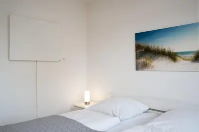 Ein Bett oder Betten in einem Zimmer der Unterkunft Kammerweg 89 Ankerplatz