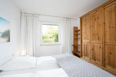 Ein Bett oder Betten in einem Zimmer der Unterkunft Kammerweg 89 Ankerplatz