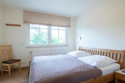Ein Bett oder Betten in einem Zimmer der Unterkunft Haus am Kurpark Timmendorfer Strand Wohnung 4