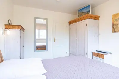 Ein Bett oder Betten in einem Zimmer der Unterkunft Haus am Kurpark Timmendorfer Strand Wohnung 4