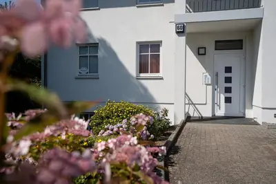 Eine Fassade oder ein Eingang zu Haus am Kurpark Timmendorfer Strand Wohnung 4