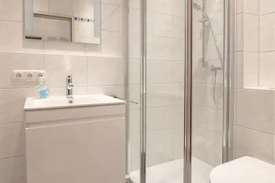 Ein Badezimmer in der Unterkunft Familyhaus- Wohnung 8