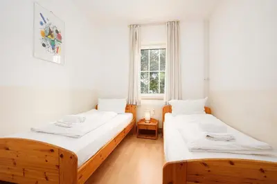 Ein Bett oder Betten in einem Zimmer der Unterkunft Seepark Muschelschubser