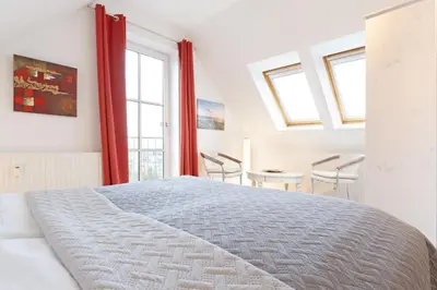 Ein Bett oder Betten in einem Zimmer der Unterkunft Sperlingslust