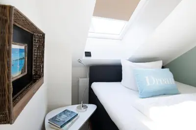 Ein Bett oder Betten in einem Zimmer der Unterkunft Badeweg 7 Humphrey Bogard