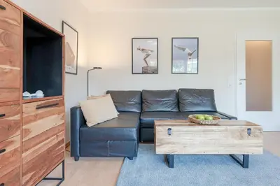 Ein Sitzbereich in der Unterkunft Seepark Lindenallee Waterkant Scharbeutz