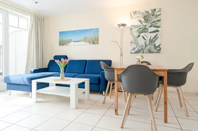 Ein Sitzbereich in der Unterkunft Strandvilla 27- Turmwohnung