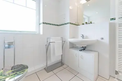 Ein Badezimmer in der Unterkunft Strandvilla 27- Turmwohnung