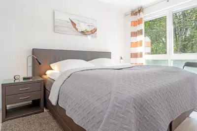 Ein Bett oder Betten in einem Zimmer der Unterkunft Strandvilla Augustusbad Ostseeparadies