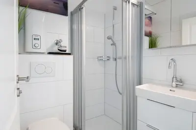 Ein Badezimmer in der Unterkunft Badeweg 4 Sandkorn 1