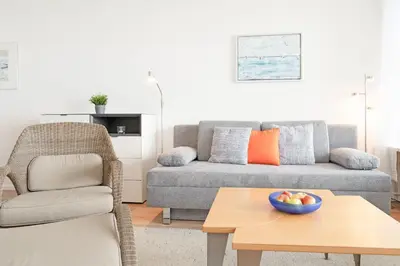 Ein Sitzbereich in der Unterkunft Hang 13 Meerblick 18