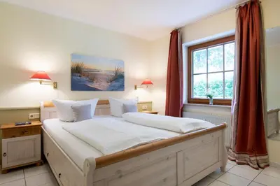 Ein Bett oder Betten in einem Zimmer der Unterkunft Haus am Kurpark Scharbeutz Wohnung 3