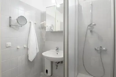 Ein Badezimmer in der Unterkunft Haus am Kurpark Scharbeutz Wohnung 3