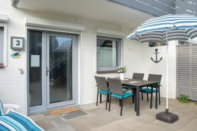 Ein Patio oder anderer Außenbereich in der Unterkunft Badeweg 4 Strandbutze