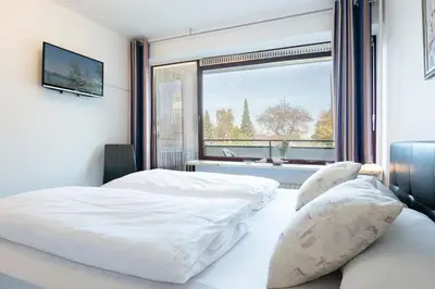 Ein Bett oder Betten in einem Zimmer der Unterkunft Gorch-Fock-Ring 28 Gorch-Fock II