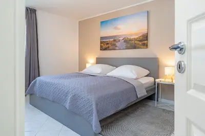 Ein Bett oder Betten in einem Zimmer der Unterkunft Hansa-Residenz Strandglück