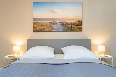 Ein Bett oder Betten in einem Zimmer der Unterkunft Hansa-Residenz Strandglück