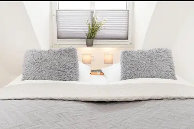 Ein Bett oder Betten in einem Zimmer der Unterkunft Hansa-Residenz Dünennest